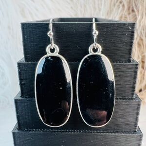 Vintage weighted black and silvertone pierced earrings